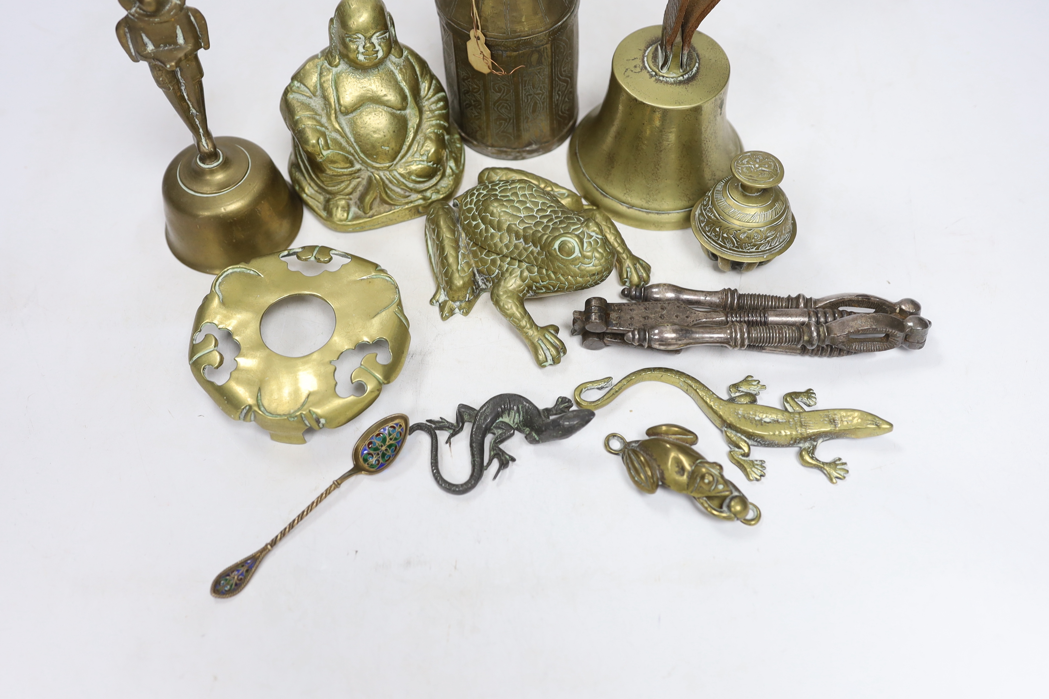 Sundry metalware including hinged brass frog with compartment, nutcrackers, a seated Buddha and a 925 gilt enamel spoon